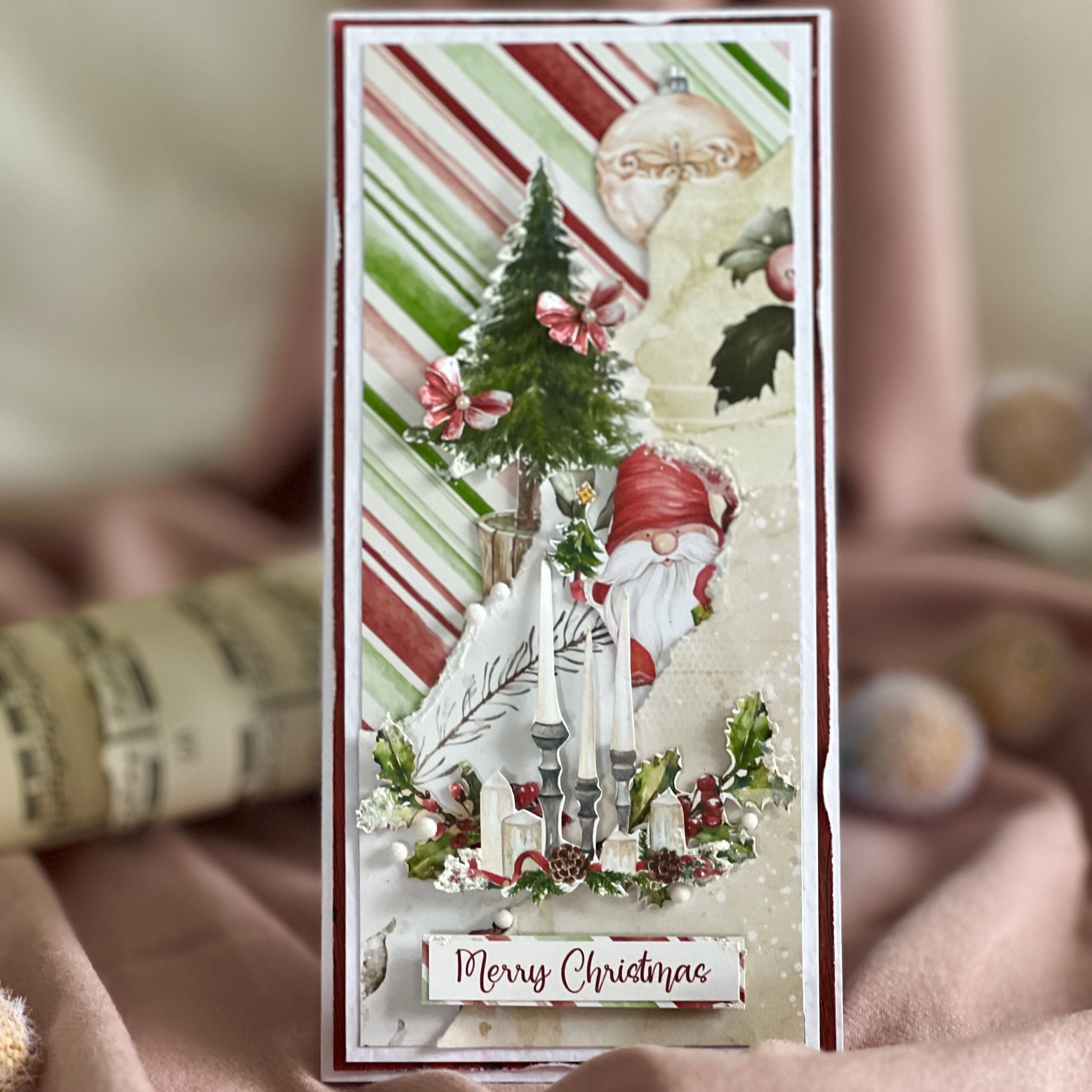 Handmade Christmas card with a dwarf and a Christmas treein a festive pattern