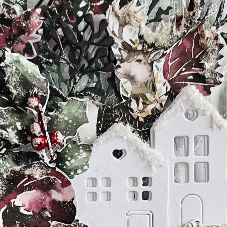 Deatail of Embossed Branches on Christmas card Close-up of embossed branches with snow effects on a handmade Christmas card