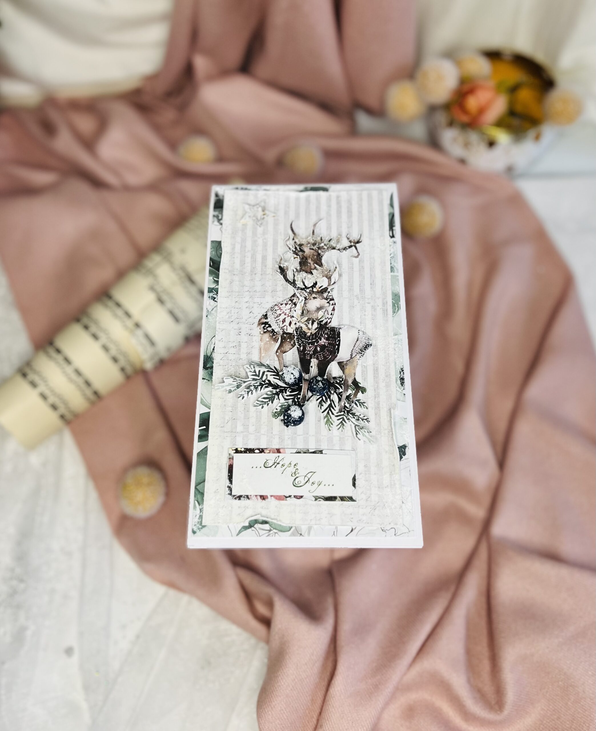 Christmas Card with Moose,Snow, and Bauble Artistic White and Green Christmas Card with Snowy Moose