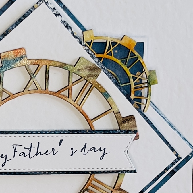 Clock detail on Father's Day card Close-up of the clock desing on a handmade blue and white Father Day card