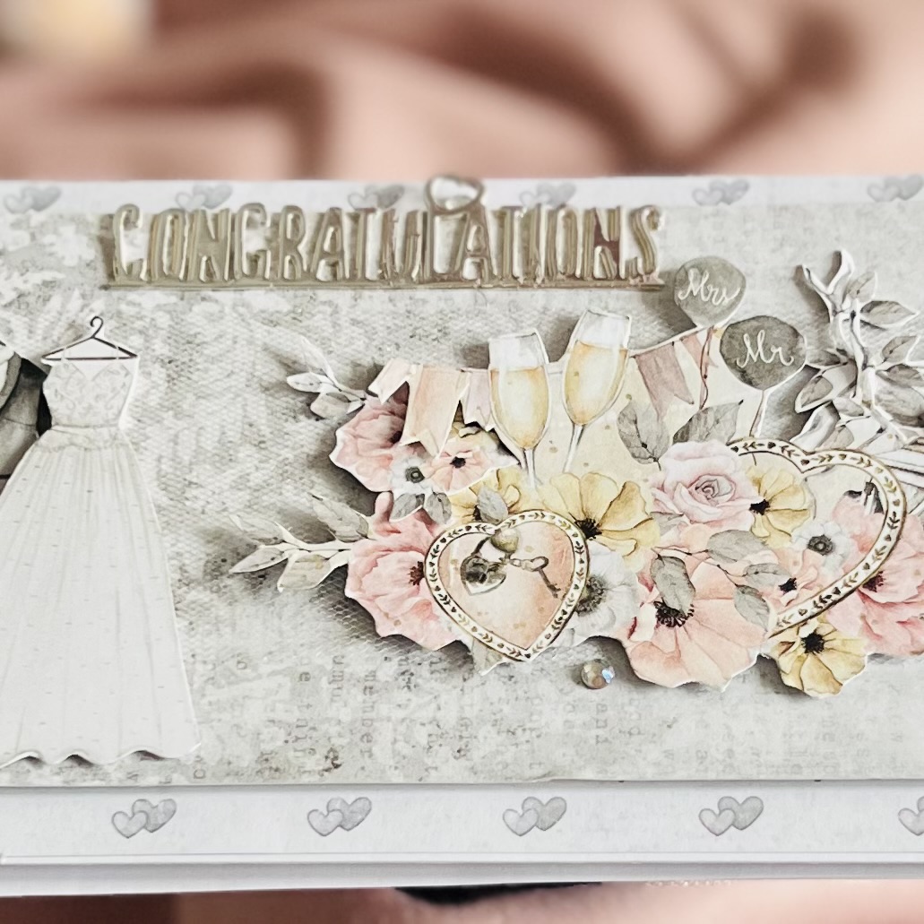 Elegant wedding card in Cream and gold featuring champage