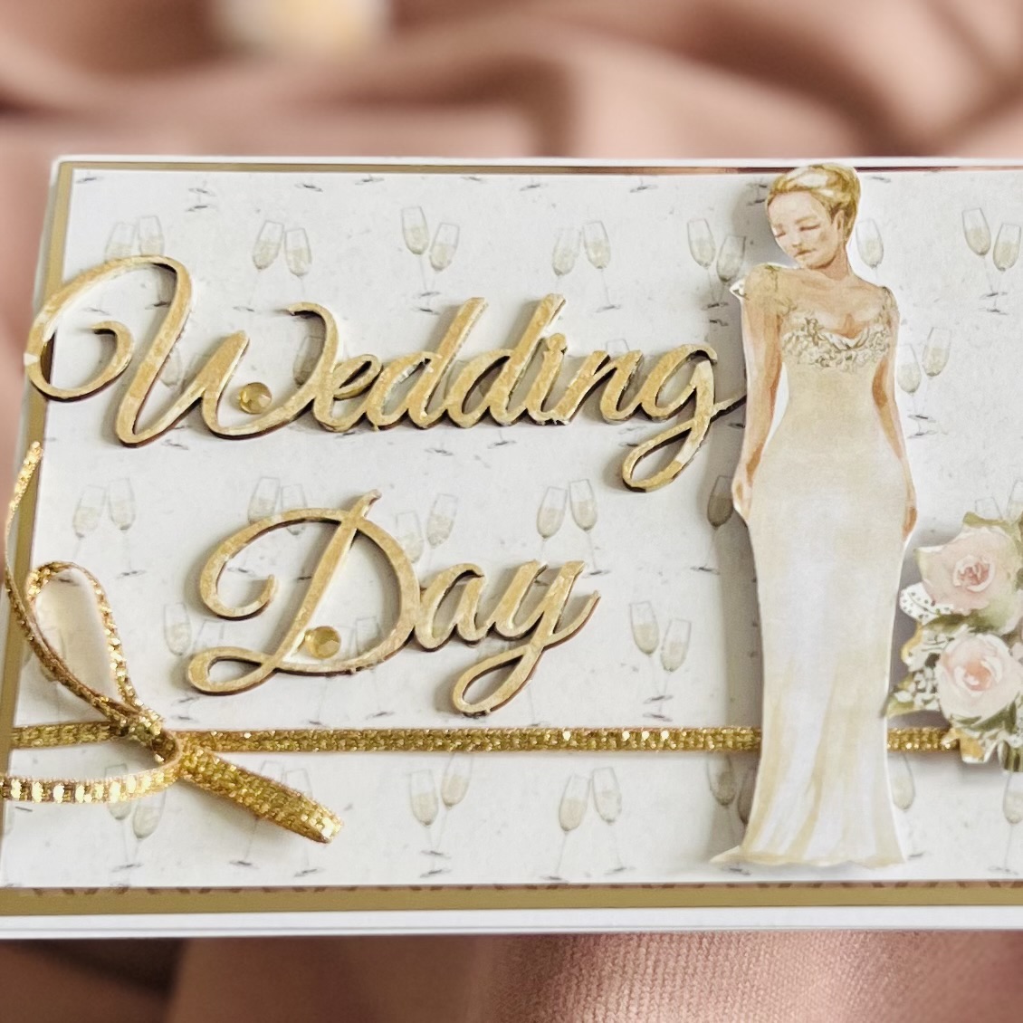 Detail of Bride and Dress on Wedding Card Close-up of bride and wedding dress detail on handmade wedding day card