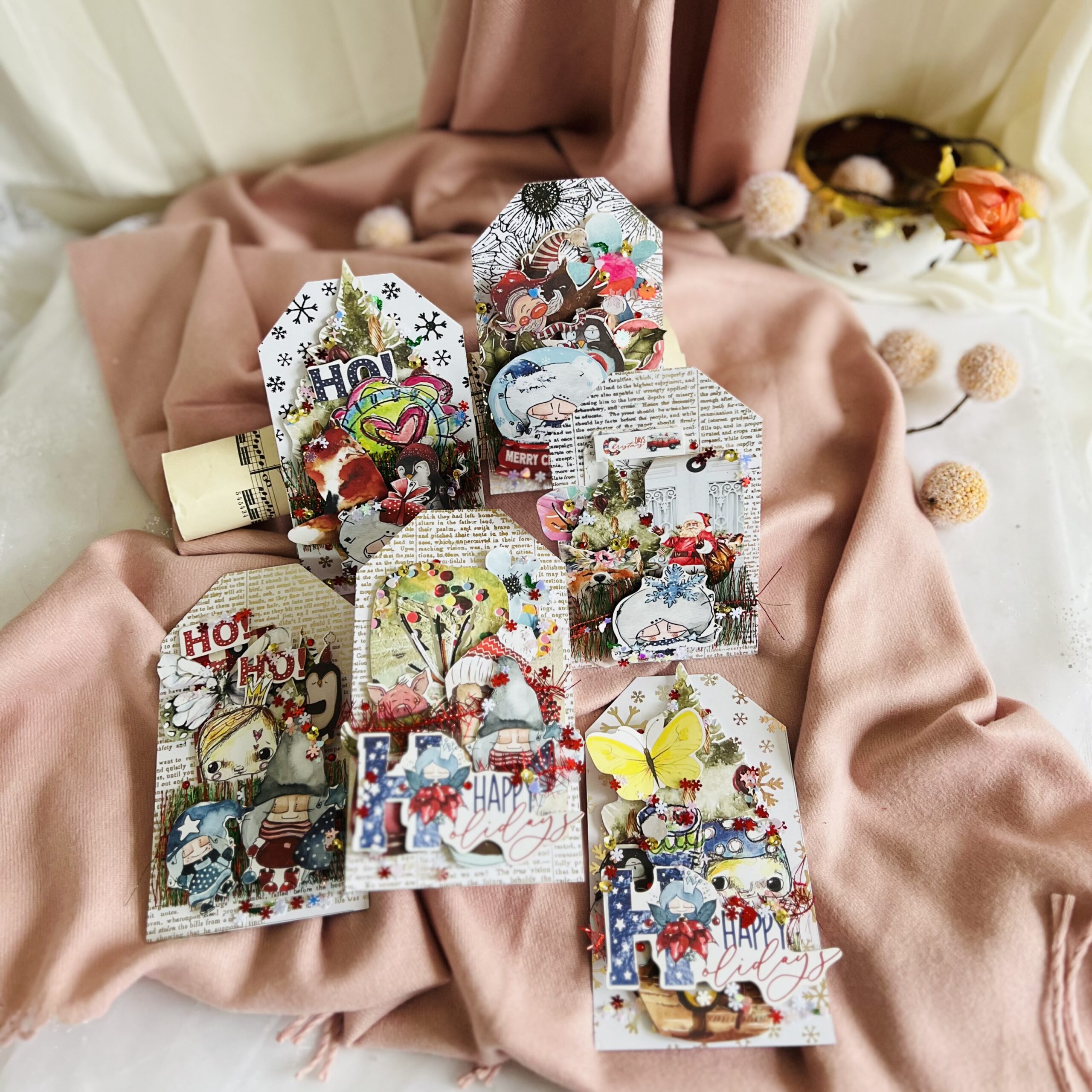 Handmade Tag-Style Card with Happy Holidays Desing Close-up of a handmade standing tag-style card with Happy Holidays,inspiration,glitter detail,and festive illustrations