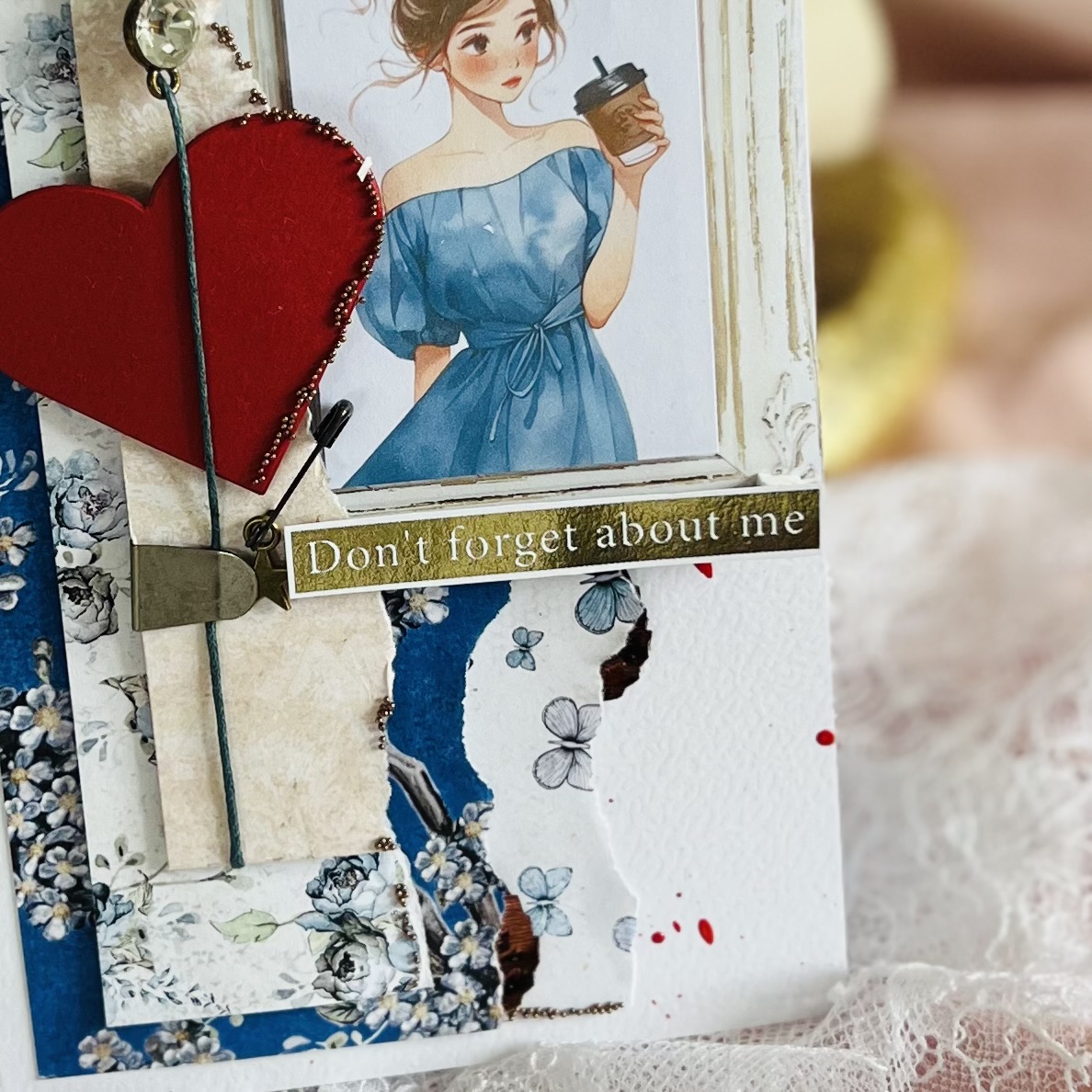 Luxurious handcrafted Valentines card Close-up od a framed desing on the Valentines day card,showing a young girl surrounded by delicate stars and a bold red heart